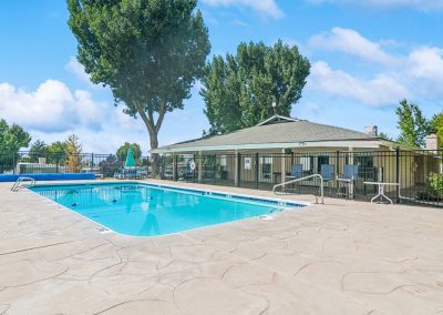 Swimming pool and sundeck at Timpanogos Village MHC in Orem City, Utah